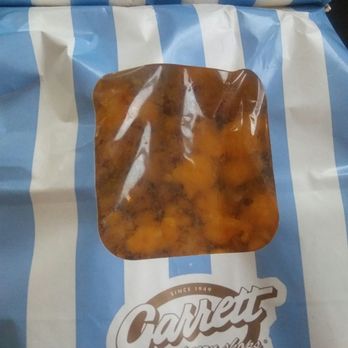Garrett Popcorn Shops - I had good intentions to deliver a full bag of the Chgo Mix (cheese and caramel). Needless to say,  I'm ordering a tin of Popcorn. - Popcorn Shops Near Me - Chicago, Illinois