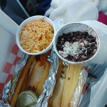 Suy's Mexican Restaurant - On the R: Pork tamale On the left: pepper and cheese (both more than half gone), rice and beans. - Mexican Near Me - Tampa Bay, Florida Suy's Mexican Restaurant - On the R: Pork tamale On the left: pepper and cheese (both more than half gone), rice and beans. - Mexican Near Me - Tampa Bay, Florida