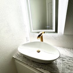 JC Tile & Countertops - JC installed the bathroom vanity, countertop, sink, faucet & electrical