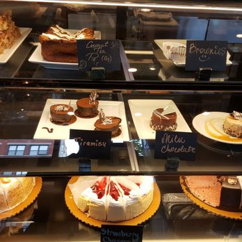 Meli Cafe - Array of innocent looking cakes. - New American Near Me - Chicago, Illinois Meli Cafe - Array of innocent looking cakes. - New American Near Me - Chicago, Illinois