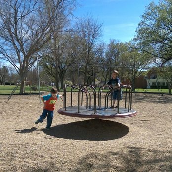 Stephen F. Austin Park - I haven't seen a merry-go-round at a playground for years. Both boys said they had never been on one before. - Parks Near Me - Amarillo, Texas Stephen F. Austin Park - I haven't seen a merry-go-round at a playground for years. Both boys said they had never been on one before. - Parks Near Me - Amarillo, Texas