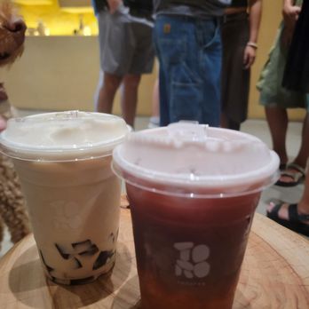 Torotea - Cassia Milktea with Brown Sugar Tapiochi (left) and Mulberry Oolong with Osmanthus Jelly (right) - Bubble Tea Near Me - Santa Ana, California Torotea - Cassia Milktea with Brown Sugar Tapiochi (left) and Mulberry Oolong with Osmanthus Jelly (right) - Bubble Tea Near Me - Santa Ana, California
