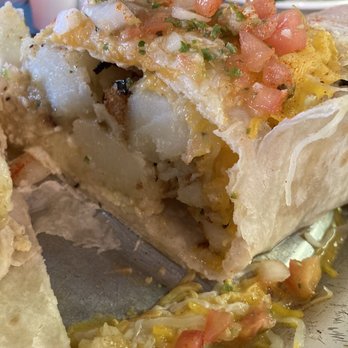 The Bluebird - Breakfast burrito with green chili on the side - Sandwiches Near Me - Casper, Wyoming The Bluebird - Breakfast burrito with green chili on the side - Sandwiches Near Me - Casper, Wyoming