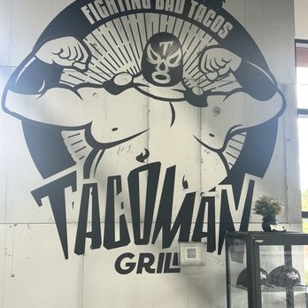Taco Man Grill - Brand sign on the wall. - Mexican Near Me - Henderson, Nevada