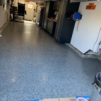 Flatix Epoxy Coating - the inside of a garage with a trash can - Flooring Near Me - Sunnyvale, California Flatix Epoxy Coating - the inside of a garage with a trash can - Flooring Near Me - Sunnyvale, California