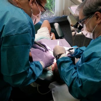 Matilsky Jeff R - Dr. Jeff Matilsky and his wife, Debbie, helping a patient. - General Dentistry Near Me - Gainesville, Florida Matilsky Jeff R - Dr. Jeff Matilsky and his wife, Debbie, helping a patient. - General Dentistry Near Me - Gainesville, Florida