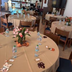 Baker Party Rentals - Our rented tables with tablecloths on them.