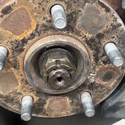 Chuck's Auto Repair - Shoreline - Missing Cotter Pin in Front Axel