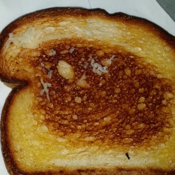 Greenhouse Cafe - their "garlic bread" was literally just a piece of toast with a couple of sprinkles of cheese off the the upper left corner - Sandwiches Near Me - Lancaster, California