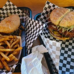 Hot honey chicken sandwich, holy smokes smash burger, and fries.