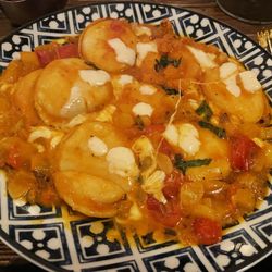 Da Giorgio - Ravioli in a fresh tomato and basel sauce with mozzarella.