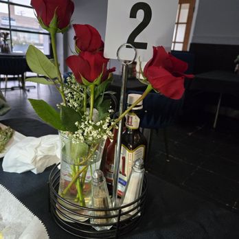 Modern 7 Bistro - Roses on the table - Soul Food Near Me - Detroit, Michigan