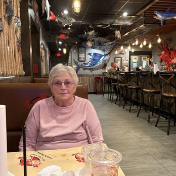 Mr. & Mrs. Crab - Pic of mom at table - Seafood Near Me - Orlando, Florida Mr. & Mrs. Crab - Pic of mom at table - Seafood Near Me - Orlando, Florida