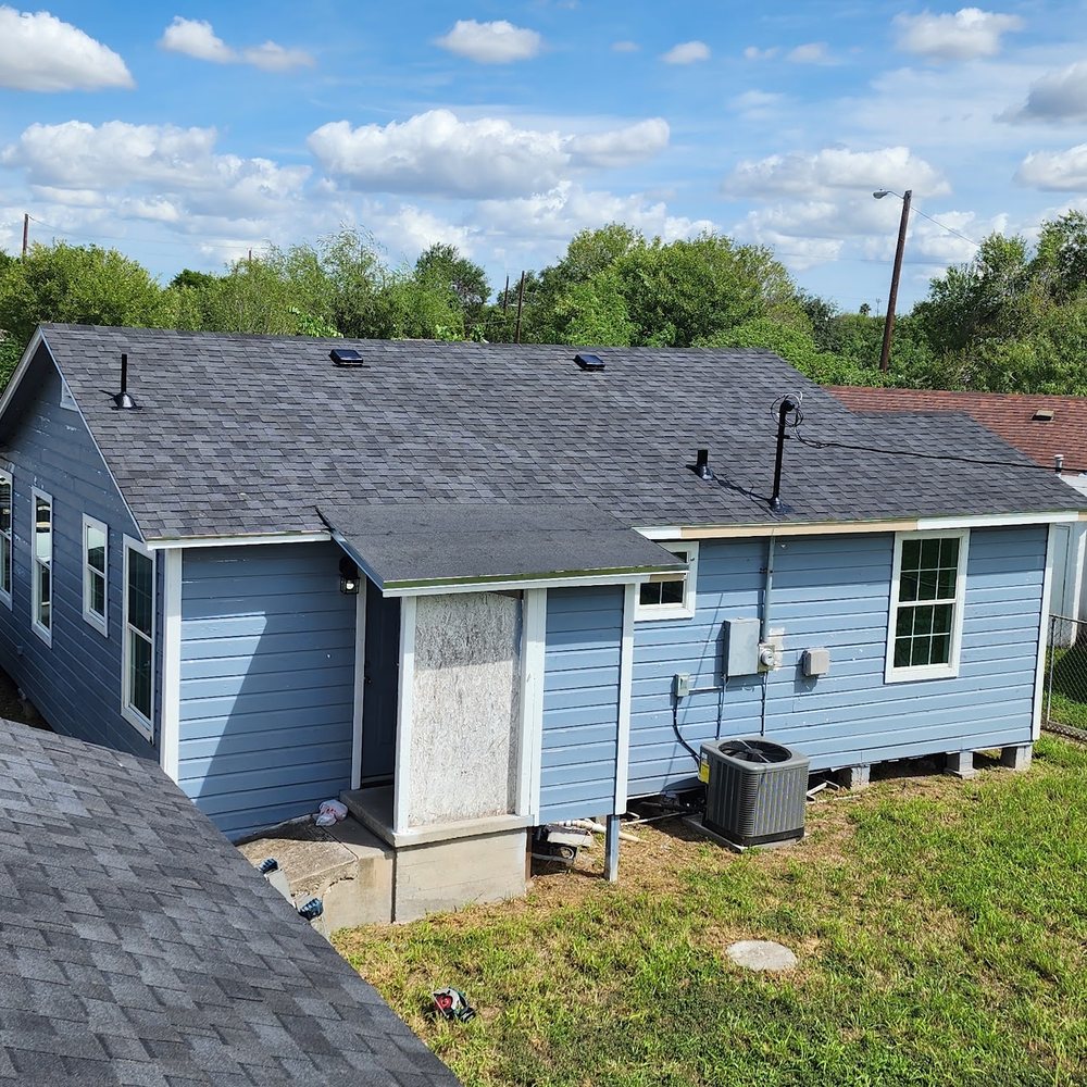 Slide of Reyes Roofing