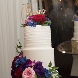 Divine Pastry Shop - Three tiered wedding cake with a new flavor in each tier