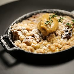 Eating House 1849 Koloa - Caramel Leche Baked Pineapple | Stuffed with Hawaiian Sugar & Spiced Macadamia Nuts.