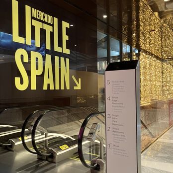 La Barra at Mercado Little Spain - Escalator down from Hudson Yards Shops to Mercado Little Spain - Spanish Near Me - New York, New York La Barra at Mercado Little Spain - Escalator down from Hudson Yards Shops to Mercado Little Spain - Spanish Near Me - New York, New York