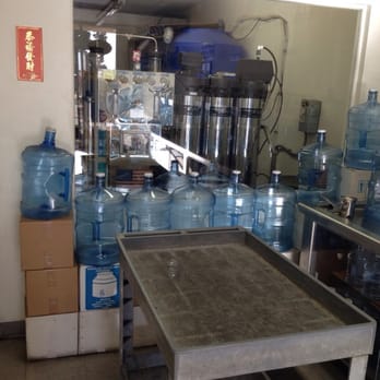 Oasis Purified Drinking Water - a counter with water bottles - Water Stores Near Me - Anaheim, California Oasis Purified Drinking Water - a counter with water bottles - Water Stores Near Me - Anaheim, California