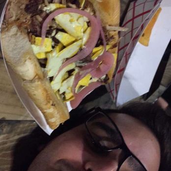 The Tank Brewing - Delicious pork sandwich featuring Izzy P. - Breweries Near Me - Miami, Florida