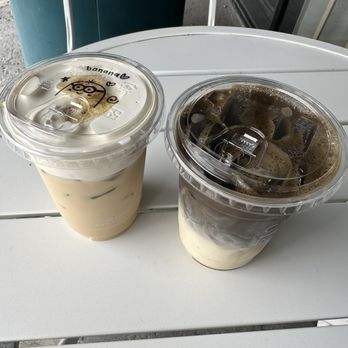 Caffe In Coffee Roasters - Left: Banana Cream Top Latte Right: Hojicha Latte - Coffee & Tea Near Me - Tustin, California Caffe In Coffee Roasters - Left: Banana Cream Top Latte Right: Hojicha Latte - Coffee & Tea Near Me - Tustin, California