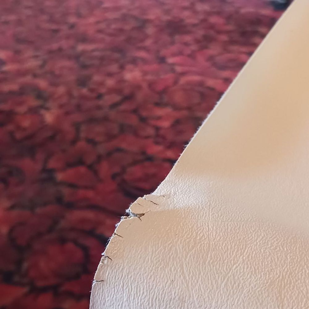 Torn and dirty tablecloth.