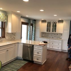 Eldon McKim-Carpet Sales and Installation - New Backsplash and Solid Hickory Hardwood