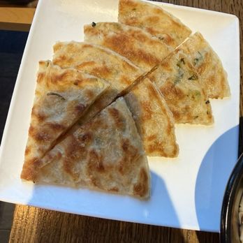 Dough Zone Dumpling House - University District - Scallion Green Onion Pancake (1) 葱油饼 - Chinese Near Me - Seattle, Washington Dough Zone Dumpling House - University District - Scallion Green Onion Pancake (1) 葱油饼 - Chinese Near Me - Seattle, Washington