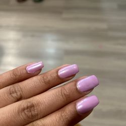 Nails of America Deer Park - "Coffin shaped" and nail polish over filled on the pinky
