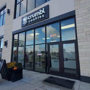 Crumbl - Cedar Rapids - Exterior of the store, in the same building at Collins Community Credit Union across from Target on the NE side of Cedar Rapids - Bakeries Near Me - Cedar Rapids, Iowa