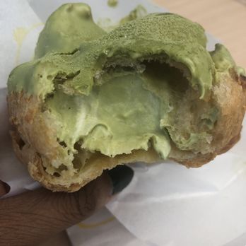 Beard Papa's - Green tea cream puff with green tea filling. Filling tastes like green tea picky ! - Desserts Near Me - New York, New York Beard Papa's - Green tea cream puff with green tea filling. Filling tastes like green tea picky ! - Desserts Near Me - New York, New York