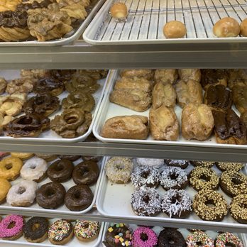 Halo Donuts - a variety of doughnuts on display - Donuts Near Me - Apple Valley, California