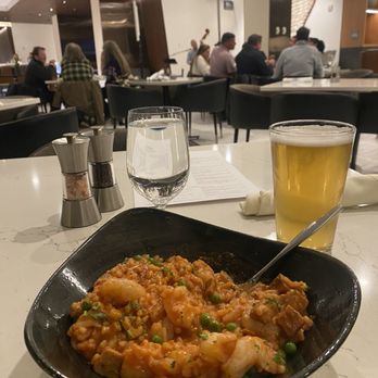 AC Lounge - Shrimp and chorizo risotto with a kolsch - Tapas/Small Plates Near Me - Vancouver, Washington