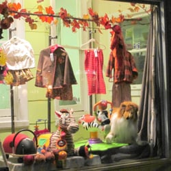 Bellies & Babies - Window of fall clothes, taken at night time