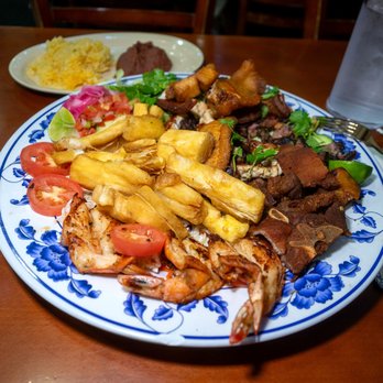 Honduras Kitchen - Plato Mixto - steak, shrimp, fish, pork chop, chicken, pico, plantain, with rice and beans - Honduran Near Me - San Francisco, California Honduras Kitchen - Plato Mixto - steak, shrimp, fish, pork chop, chicken, pico, plantain, with rice and beans - Honduran Near Me - San Francisco, California