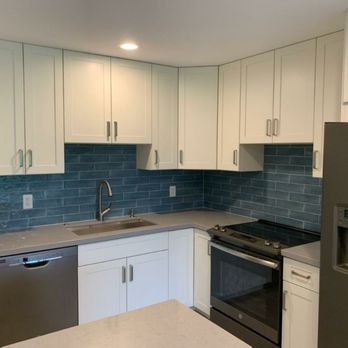 Quantum Services - Choice of color can really change the mood of a room, cool blue kitchen here... - General Contractors Near Me Quantum Services - Choice of color can really change the mood of a room, cool blue kitchen here... - General Contractors Near Me