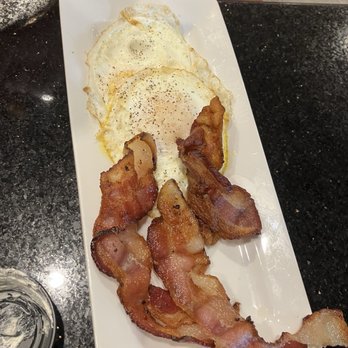 Keke's Breakfast Cafe - Eggs over easy with bacon - Breakfast & Brunch Near Me - Cape Coral, Florida Keke's Breakfast Cafe - Eggs over easy with bacon - Breakfast & Brunch Near Me - Cape Coral, Florida
