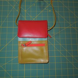 Exquisite Leather & Luggage - Front of one purse returned