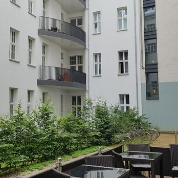 Citadines Apart hotel - Central courtyard with patio. - Hotels Near Me - Berlin, BE