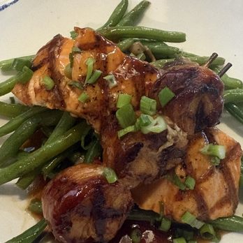 Rusty Bellies - 86 Proof - salmon and scallops with green beans and bourbon glaze sauce - Seafood Near Me - Tarpon Springs, Florida Rusty Bellies - 86 Proof - salmon and scallops with green beans and bourbon glaze sauce - Seafood Near Me - Tarpon Springs, Florida