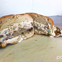 Up In Smoke Eatz - Our Tri Tip Sammy topped with homemade slaw, pickles, and creamy horseradish sauce!