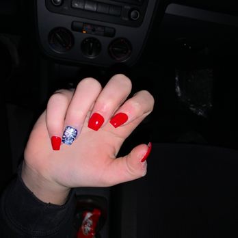 Escape Nails & Day Spa - she asked for a snowman originally but it look awful so after she asked to just have a white snowflake.... - Nail Salons Near Me - Gainesville, Virginia