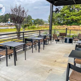 Starbucks - Covered Patio with six tables and thirteen chairs. - Coffee & Tea Near Me - Atlanta, Texas Starbucks - Covered Patio with six tables and thirteen chairs. - Coffee & Tea Near Me - Atlanta, Texas