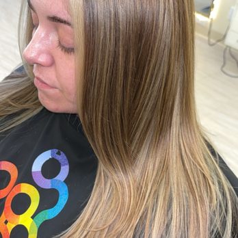 Rendezvous Hair Studio - Full highlight with the money, piece, Blond, and a fresh haircut by Monica at Rendezvous hair studio - Hair Salons Near Me - Lubbock, Texas