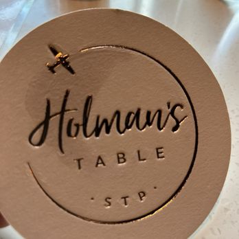 Holman's Table - DO stop what you're doing & enjoy yourself. Sit by window or on patio, watch helicopters ferry tourists & small aircraft come & go. - Bars Near Me - Saint Paul, Minnesota Holman's Table - DO stop what you're doing & enjoy yourself. Sit by window or on patio, watch helicopters ferry tourists & small aircraft come & go. - Bars Near Me - Saint Paul, Minnesota