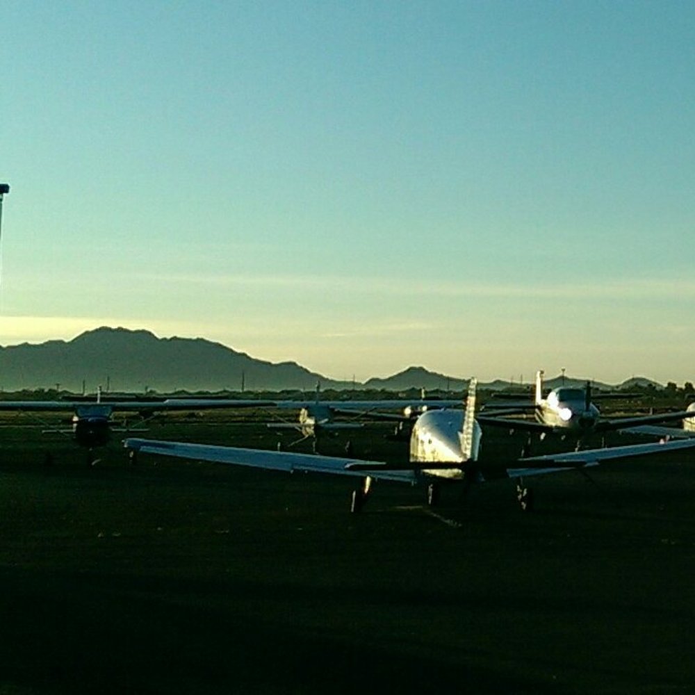 Hangar Cafe - Sun, airplane, and people rise to this view of San Tan Mountain from Hangar Cafe! - Cafes Near Me - Chandler, Arizona