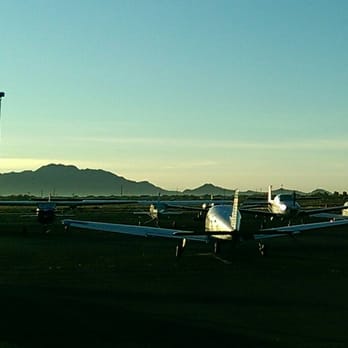 Hangar Cafe - Sun, airplane, and people rise to this view of San Tan Mountain from Hangar Cafe! - Cafes Near Me - Chandler, Arizona
