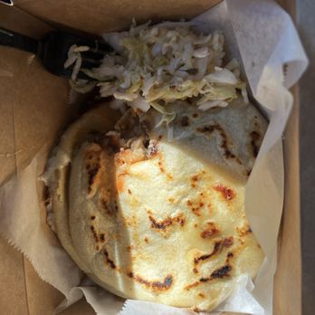Balompie Cafe No 3 - Two pupusas with a dollop of slaw and some salsa - Seafood Near Me - San Francisco, California Balompie Cafe No 3 - Two pupusas with a dollop of slaw and some salsa - Seafood Near Me - San Francisco, California