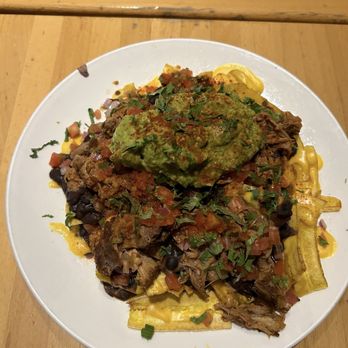 Empanada Mama - Hell's Kitchen - Mama's House Nachos - Latin American Near Me - New York, New York Empanada Mama - Hell's Kitchen - Mama's House Nachos - Latin American Near Me - New York, New York