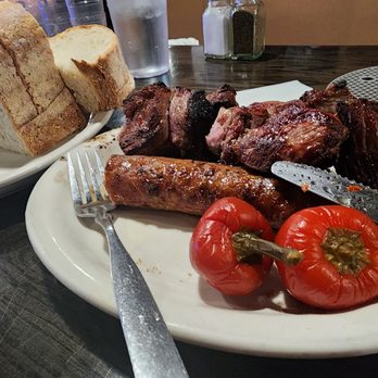 Santarpio's Pizza - Sausage and lamb skewers - Pizza Near Me - Boston, Massachusetts Santarpio's Pizza - Sausage and lamb skewers - Pizza Near Me - Boston, Massachusetts