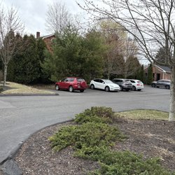 A Moment Away Massage Therapy And Spa - Parking lot and entrance.